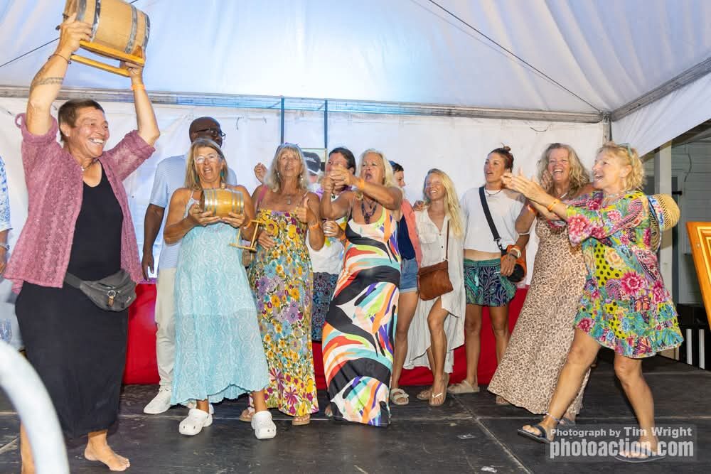 Cherub's all-female crew celebrating with their regatta trophy