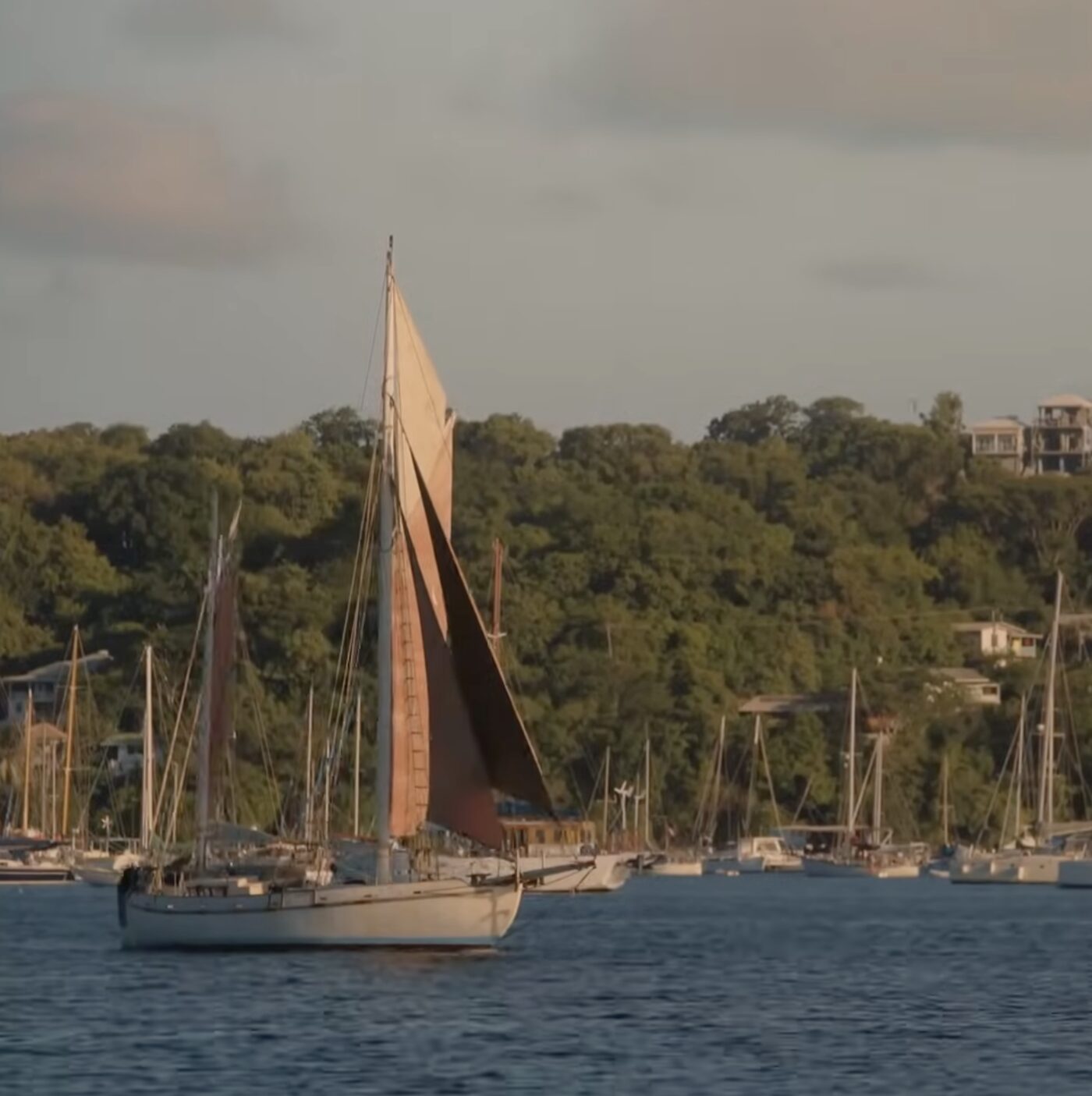 Cherub under full sail in golden light
